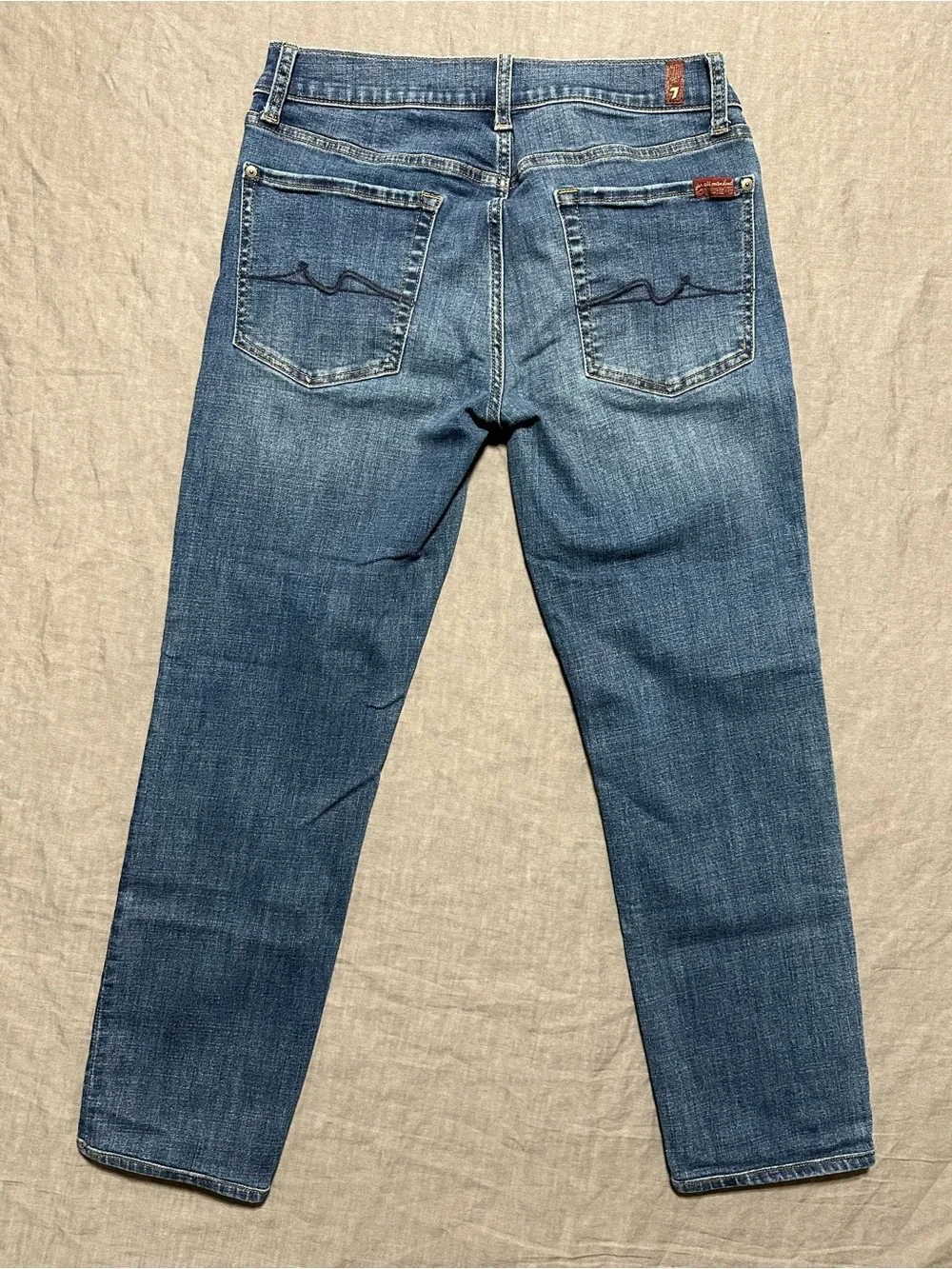 7 For All Mankind Men’s Tapered Jeans in Medium Blue Denim
